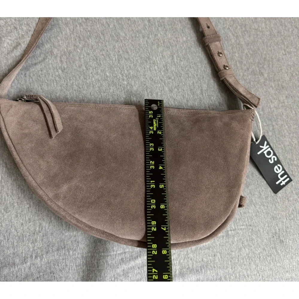 The Sak Suede Saddle Crossbody Bag in Taupe Brown